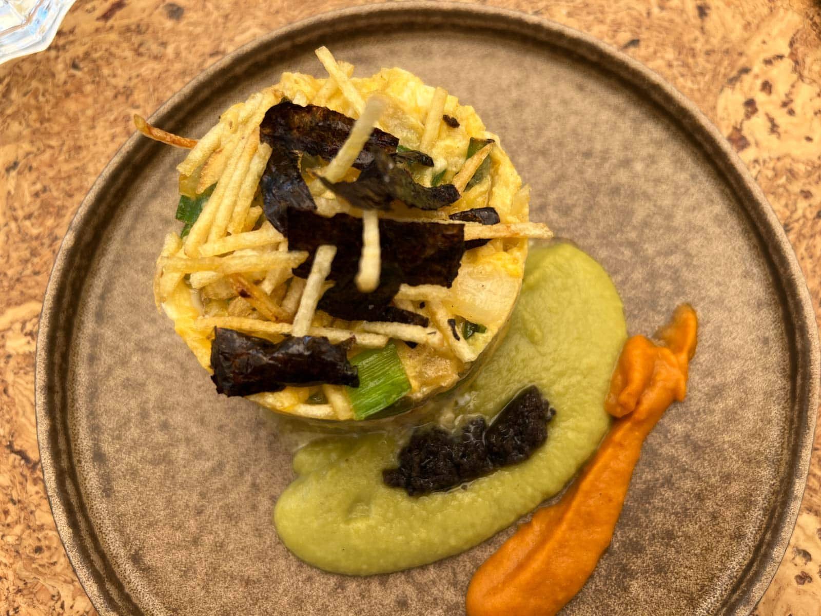 A delicious plate of Bacalhau à Brás, a traditional Portugal dish made with salt cod, potatoes, and eggs.