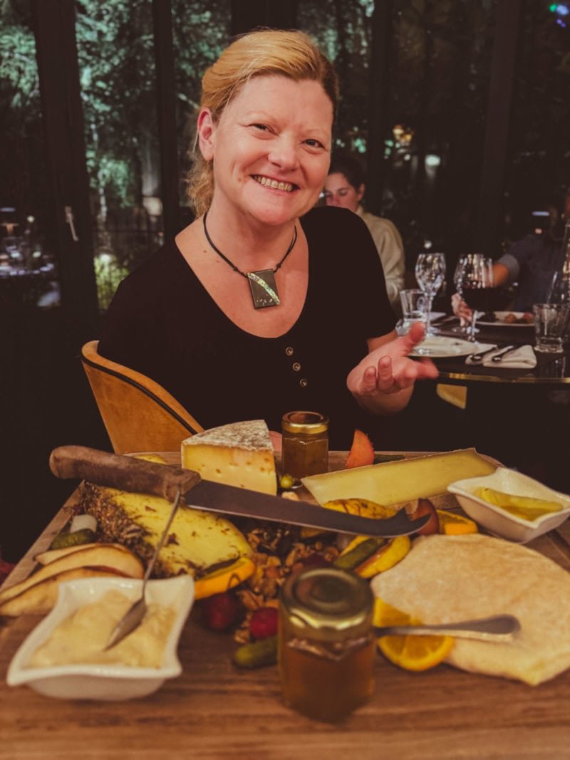 The beautiful French cheese board that was created for our apéro with cheeses from a local market in Beaujolais