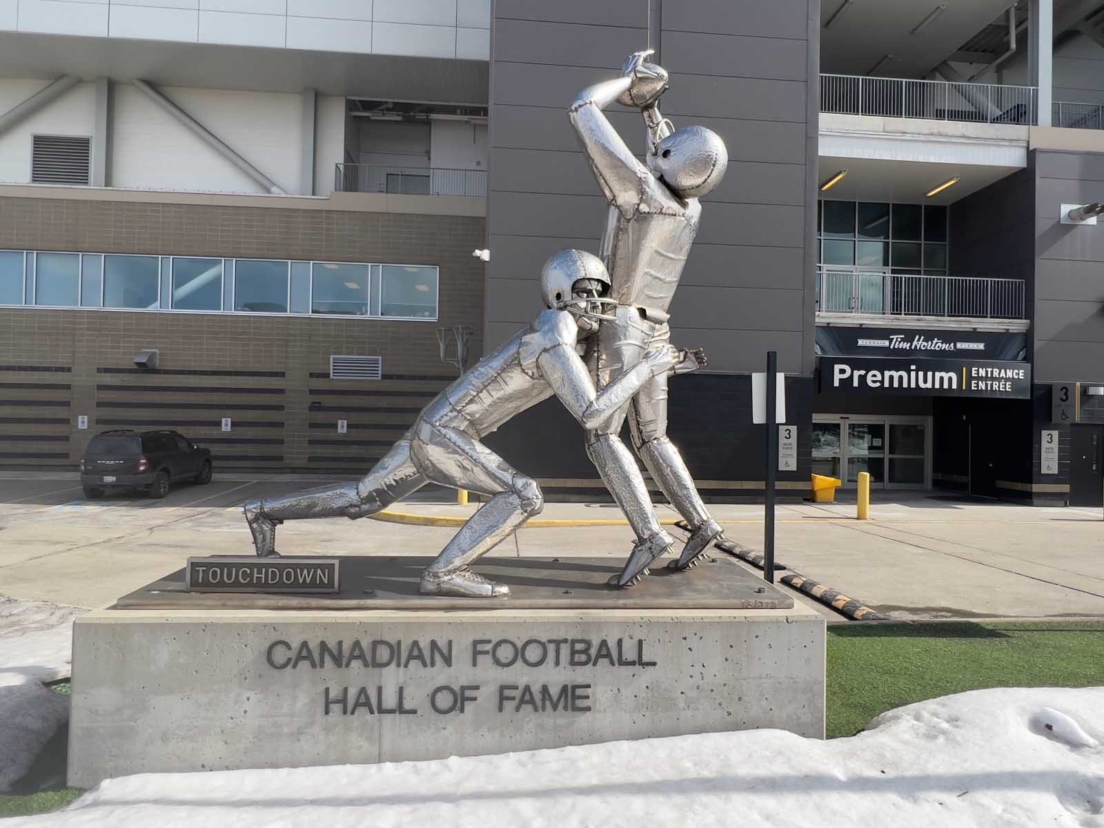 Iconic statue at the entrance to the Canadian football hall of fame and museum
